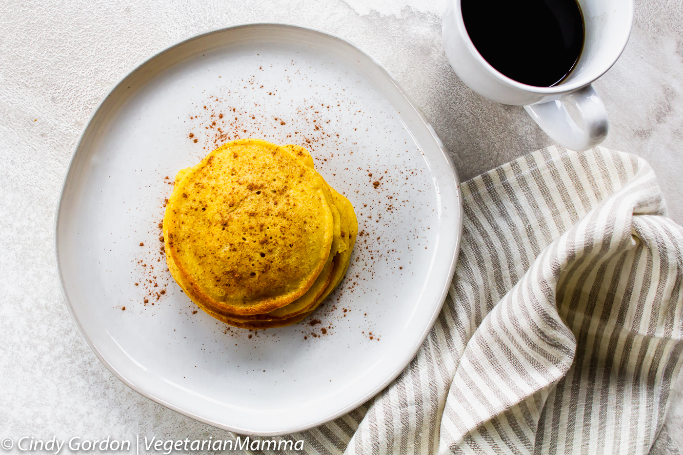 Stack of gluten free pumpkin pancakes.