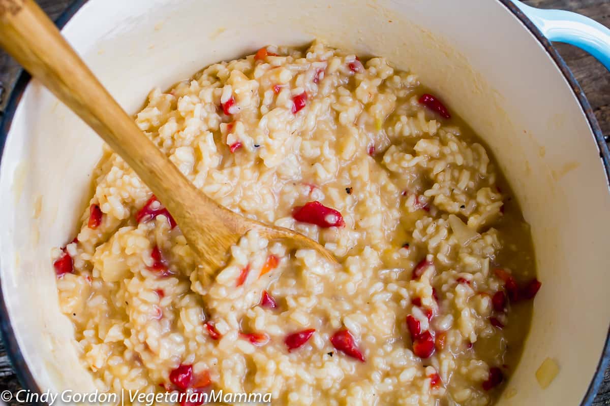 Want a quick and delicious meal? This roasted red pepper risotto will do the trick.