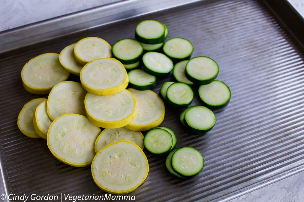 Round slices of yellow squash and zucchini