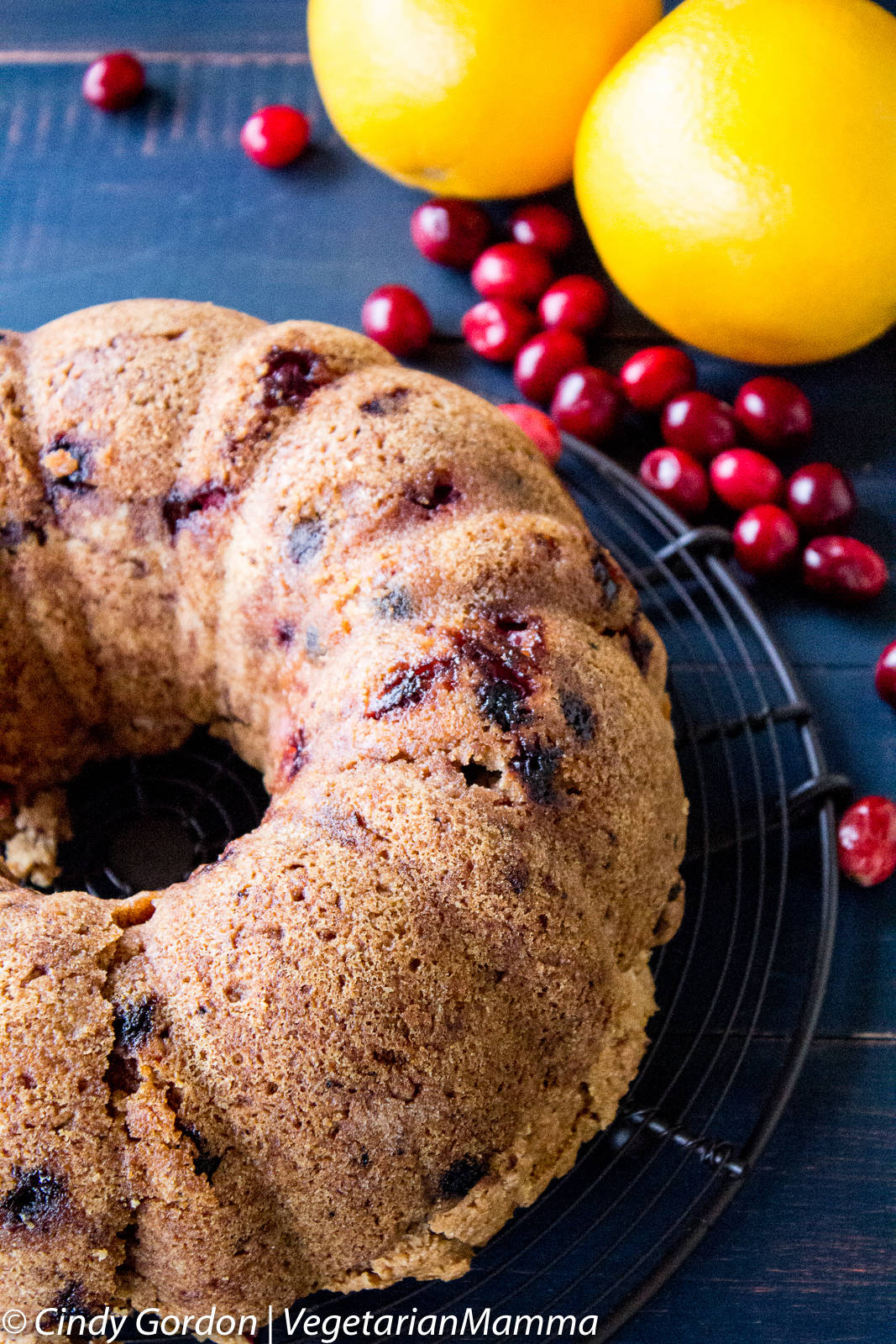 Gluten Free Cranberry Orange Cake on a cooling rack