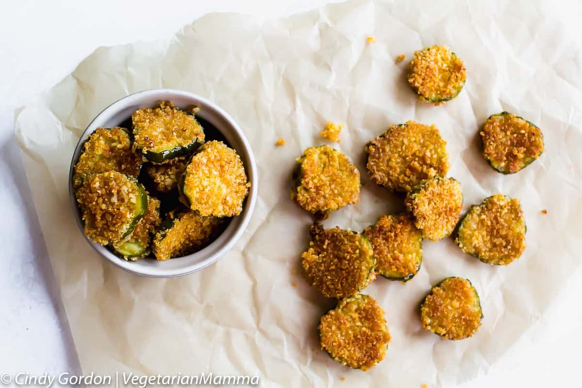 Gluten-Free Fried Pickles on a piece of crinkled parchment paper. 
