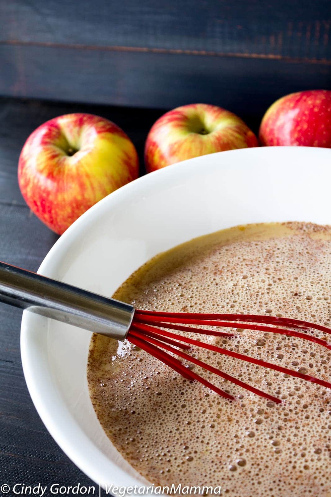 casserole mixture in a bowl with a whisk