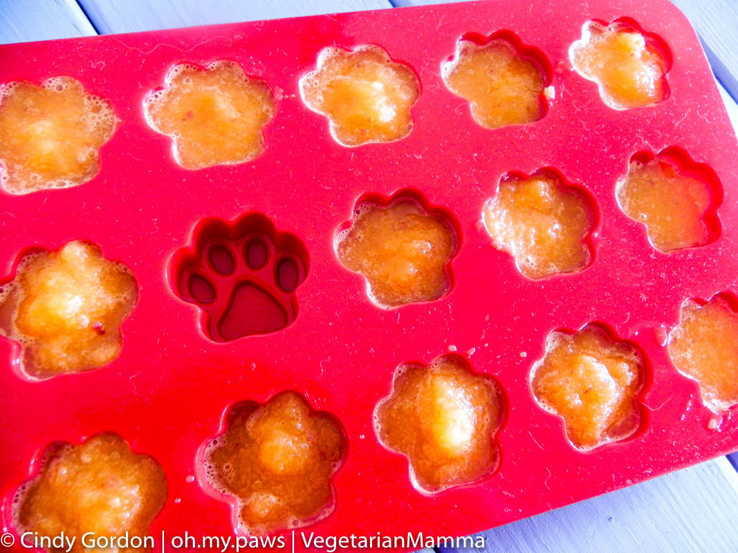 Frozen carrot apple cubes in a silicone mold