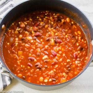 Overhead view of black pot of vegetarian sweet chili