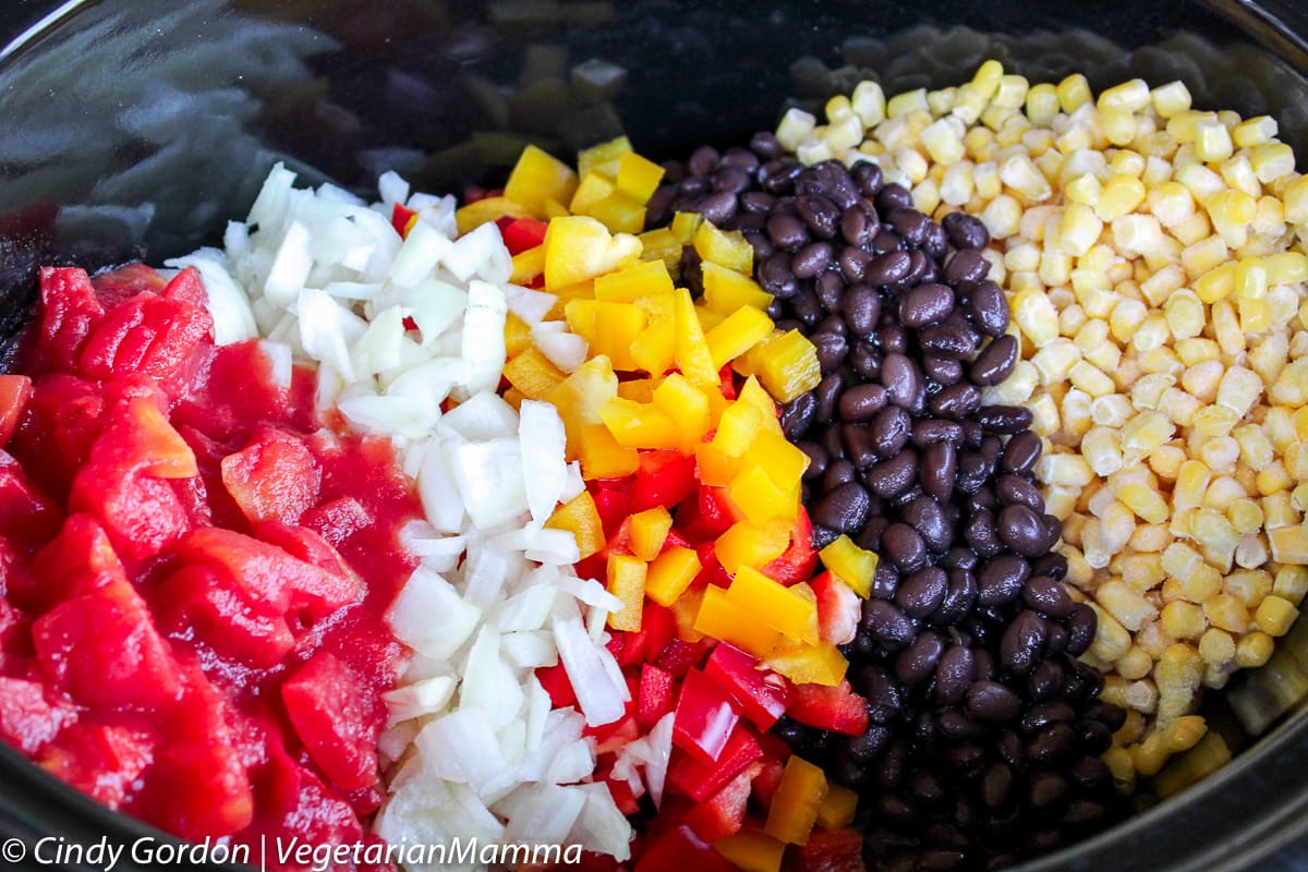 Enchilada Chowder ingredients in a slow cooker