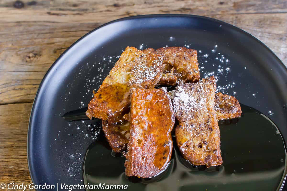 Air Fryer French Toast topped with syrup on a plate