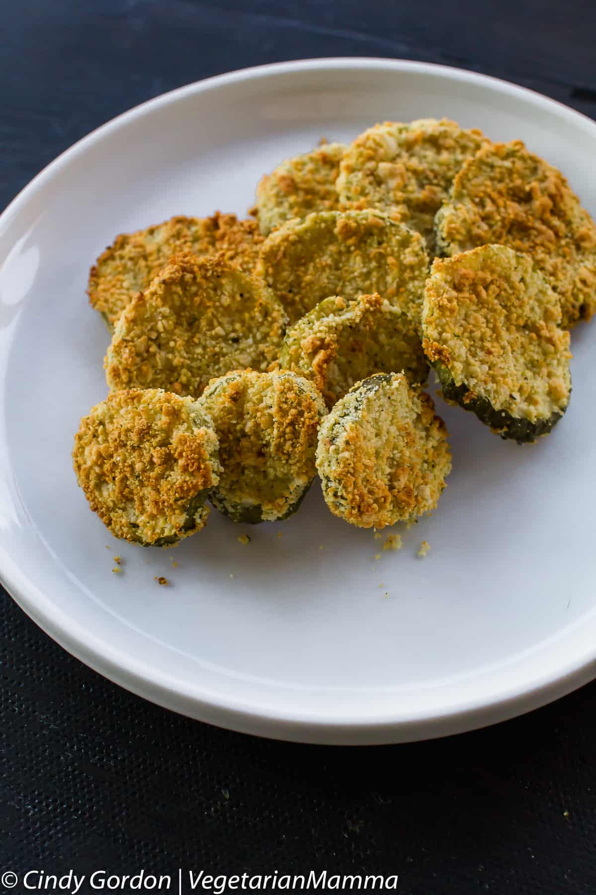 Air Fryer Fried Pickles on a white plate.