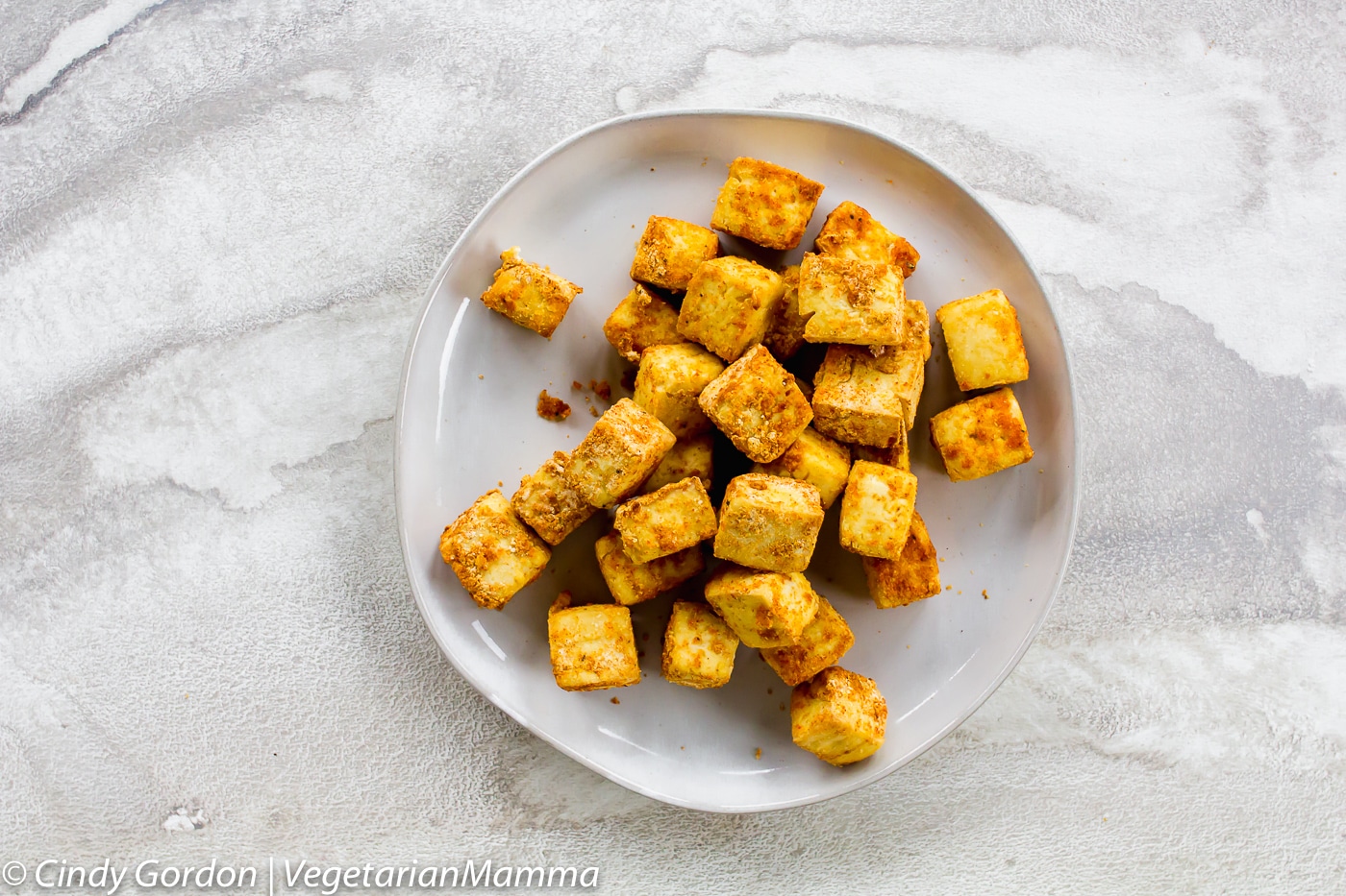 Crispy Air Fryer Tofu cubes on a plate