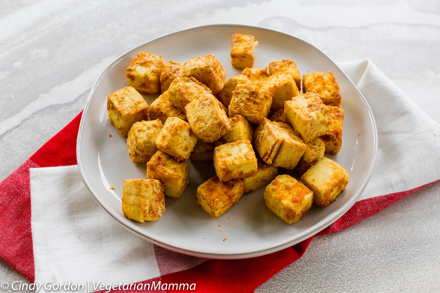 Crispy Air Fryer Tofu cubes on a plate