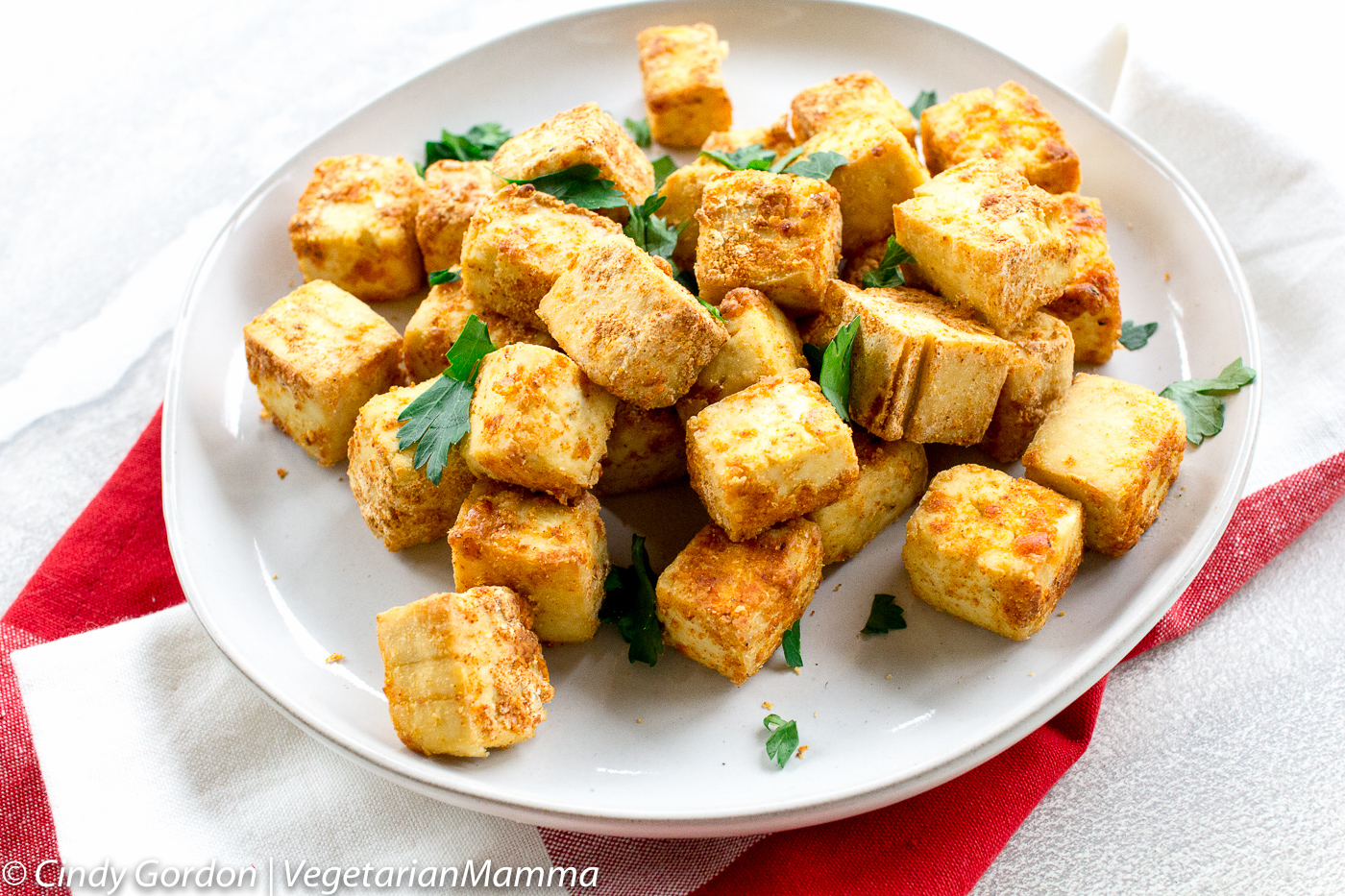 plate of Crispy Air Fryer Tofu with fresh parsley sprinkled over