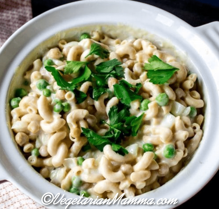 Mock Tuna Casserole served in a baking dish with parsley on top.