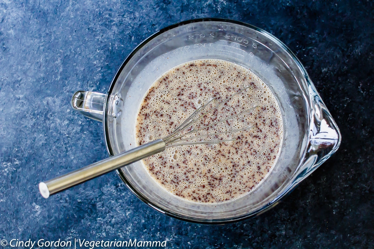 Whisk the liquids of your cinnamon roll french toast casserole.