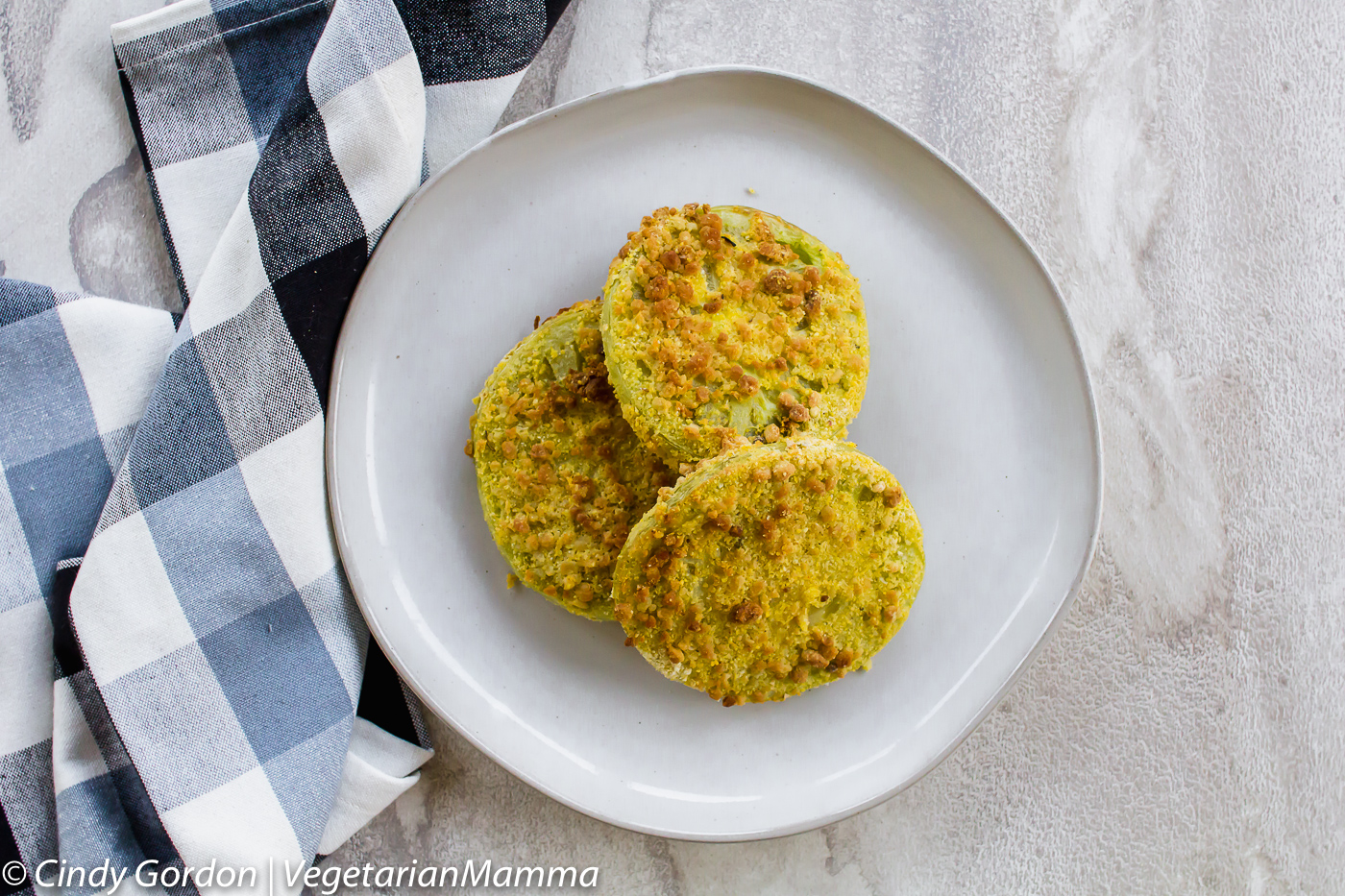Air Fryer Fried Green Tomatoes are a quick and delicious snack.