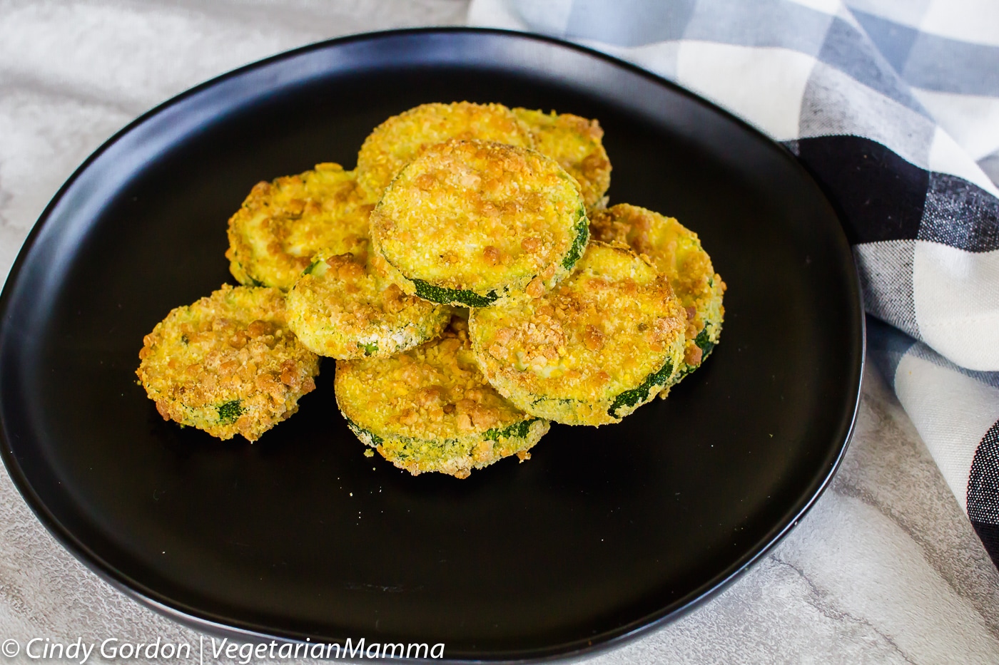 air fryer zucchini coins on a plate