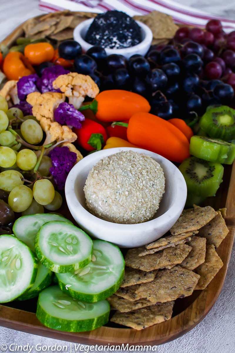 Vegetarian Charcuterie boardw with cheese ball and assortment of fruits and veggies