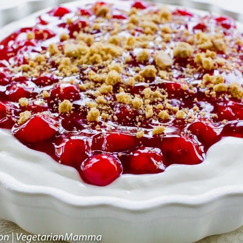 Close up view of Cherry Cheesecake in white pan