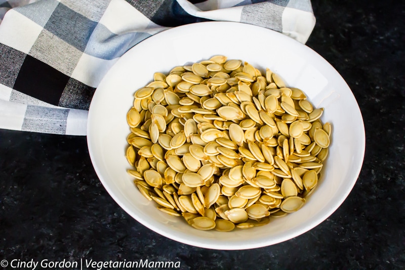 Air Fryer Pumpkin Seeds in white bowl