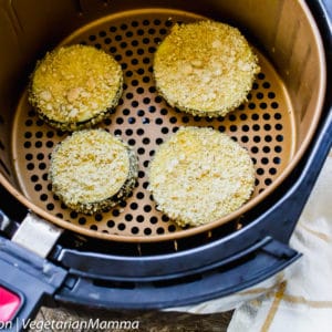 Top down view of Air Fryer Eggplant Parmesan inside of air fryer basket