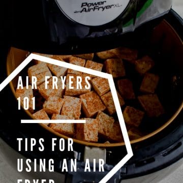 Tofu inside of Power Air Fryer atop table