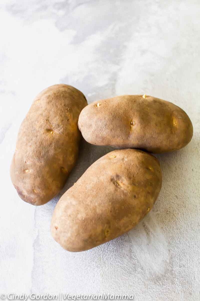 three whole potatoes