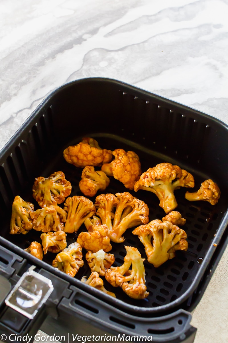 Air Fryer Honey Sriracha Cauliflower in the air fryer basket