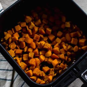 Air Fryer Sweet Potato hash in air fryer basket