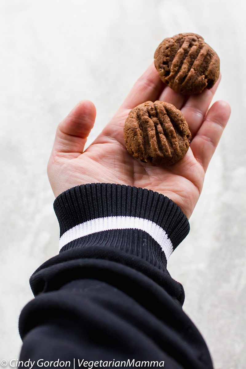 two Double Chocolate Air Fryer Cookies in someone's hand