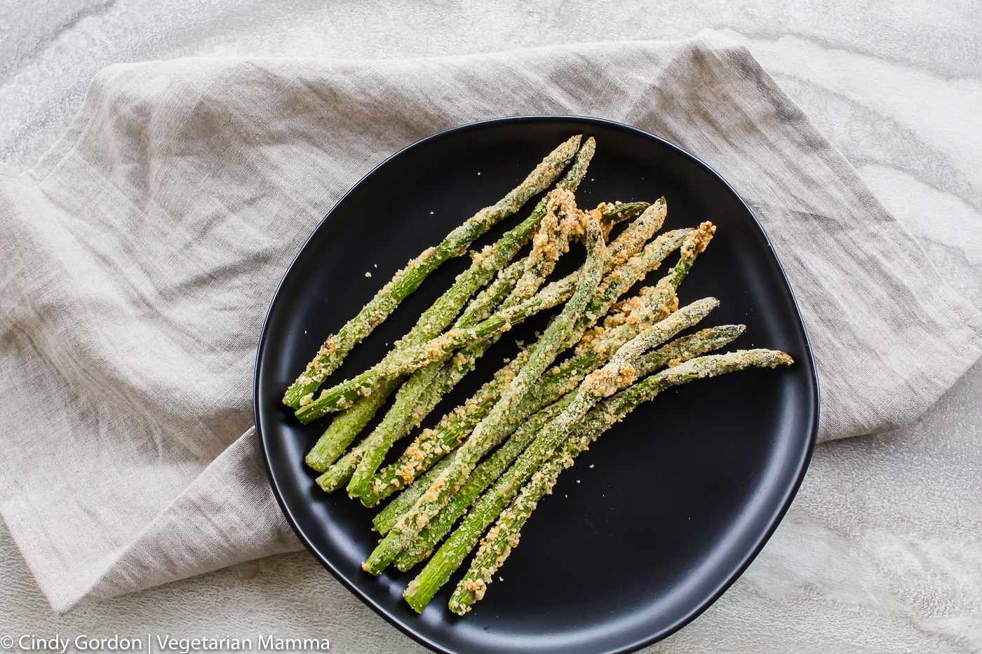 Spears of Air Fryer Crispy Asparagus on a plate