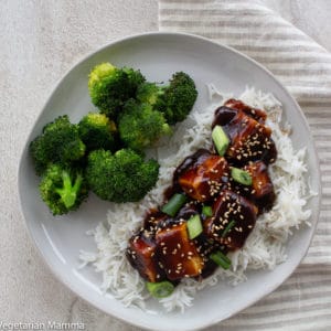 Saucy General Tso Tofu served with broccoli over rice