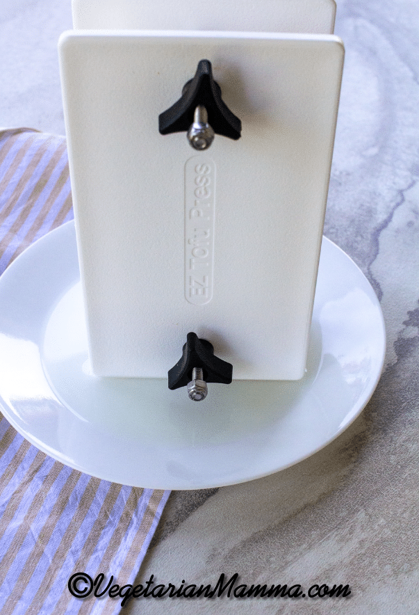 EZ Tofu press to assist with squeezing extra moisture out of the block. 