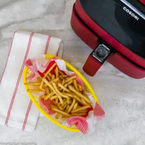 Air Fryer Frozen French Fries overview of cooked fries and air fryer unit