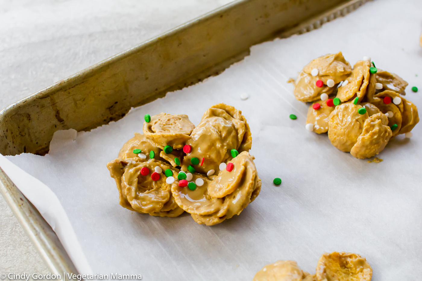 Cornflake cookies overhead shot with christmas sprinkles on top