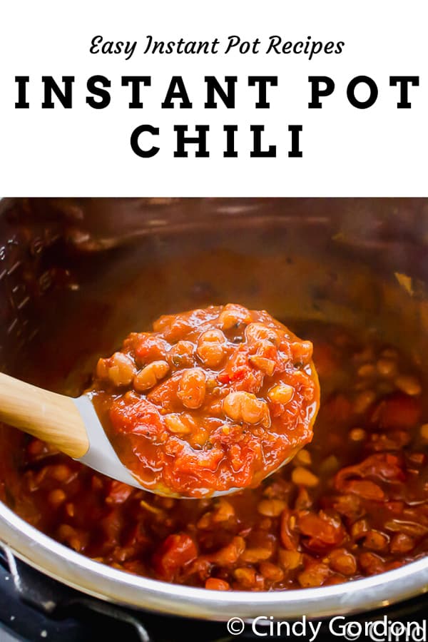 This Instant Pot Chili is totally meat-free vegan chili packed with onions, bell peppers, tomatoes, black beans, and all the seasonings! Skip the beef and make this super flavorful soup in less than 30 minutes.