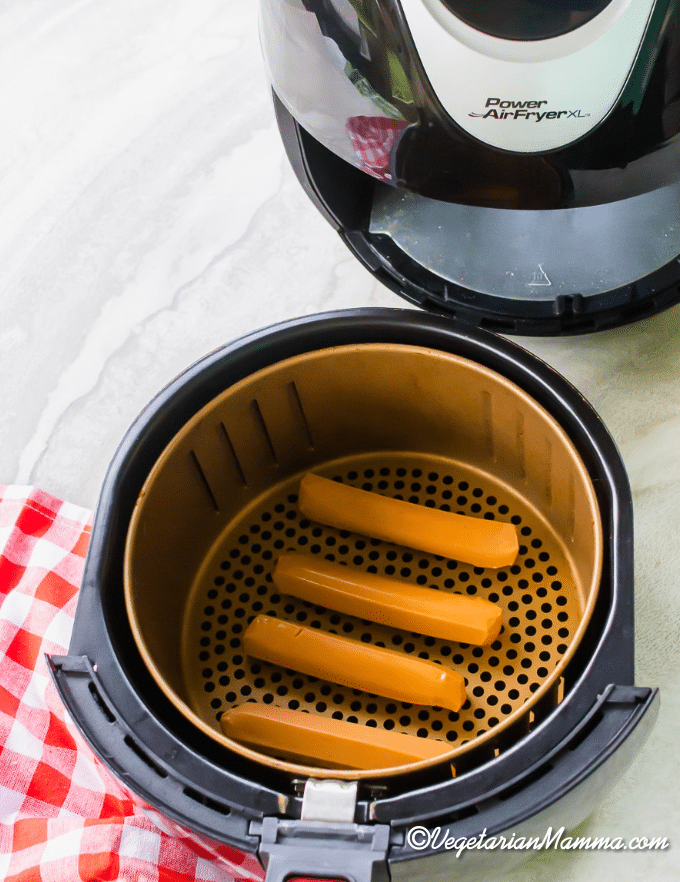 air fryer hot dogs in basket before cooking