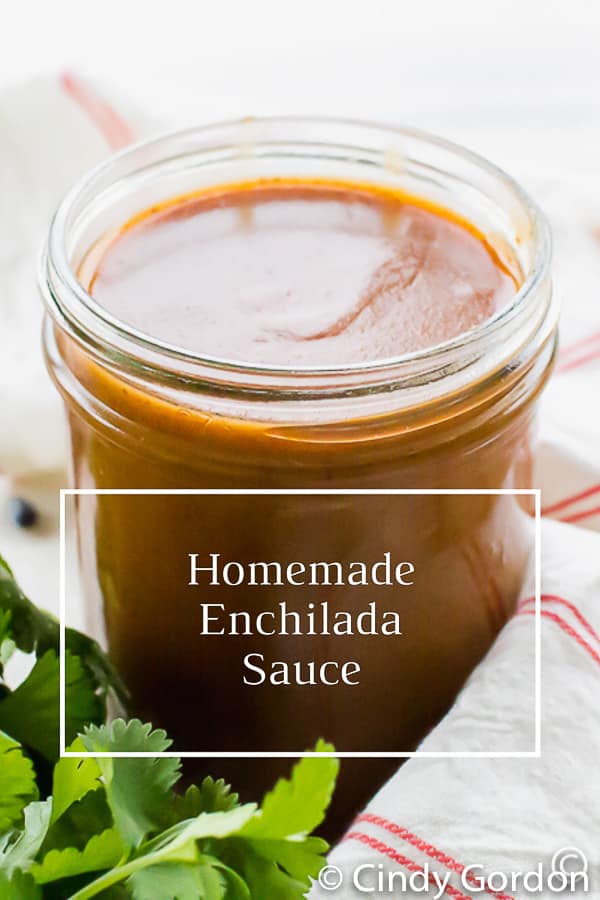 Homemade Vegan Enchilada Sauce is the perfect red sauce for all your Mexican-inspired dishes! Top yummy rolled corn tortillas with this simple tomato sauce with chili powder, cumin, garlic powder, and oregano.