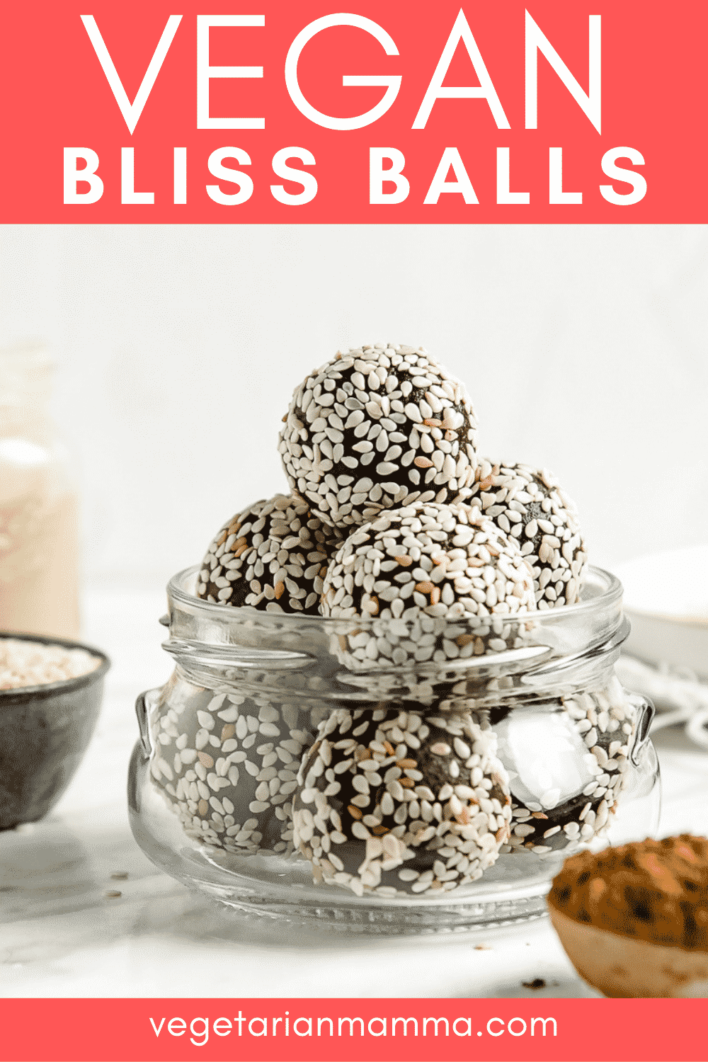 Bliss Balls are so decadent you'll forget they're healthy, too! These vegan chocolate tahini balls are covered in sesame seeds for the best no-bake dessert, afternoon snack, or even breakfast on-the-go. #vegansnack #energyballs