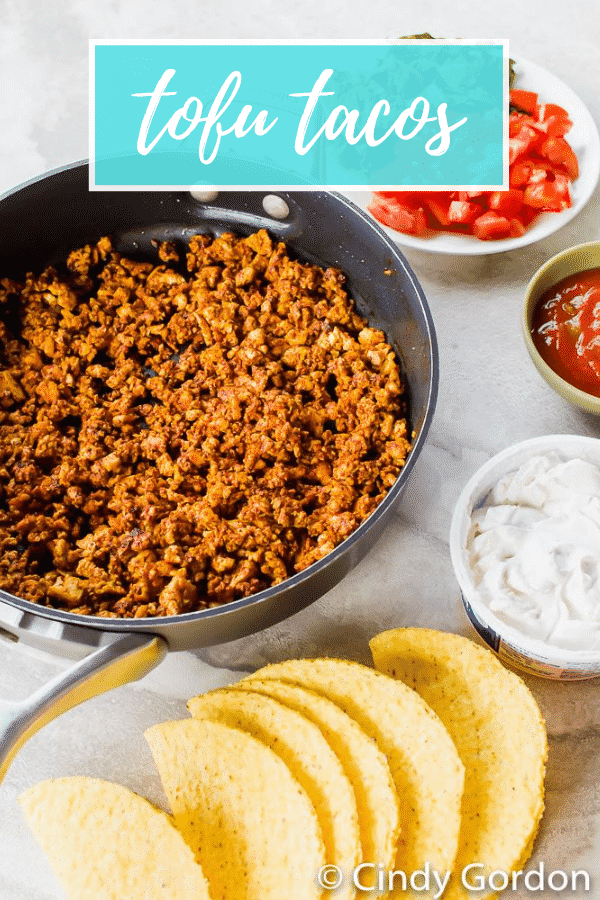 Tofu Tacos are so easy to make with a homemade taco seasoning! Crumbled tofu is the best taco "meat" made in less than half an hour with all your favorite toppings. #vegantacos #tofurecipes