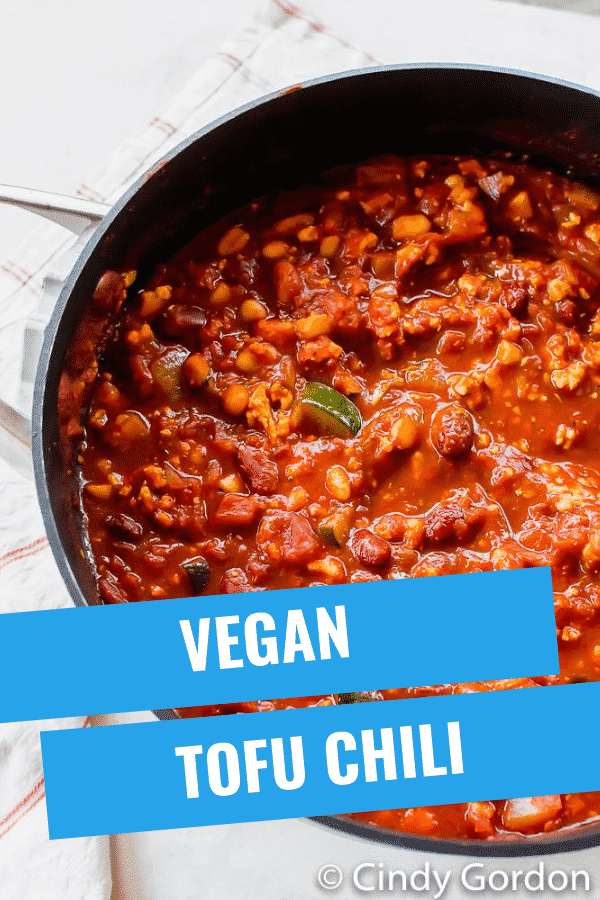 Hearty Tofu Chili is the best vegan comfort food. You can make this chili recipe in less than an hour with tons of succulent veggies and protein-packed beans. #vegansoup #veganrecipes