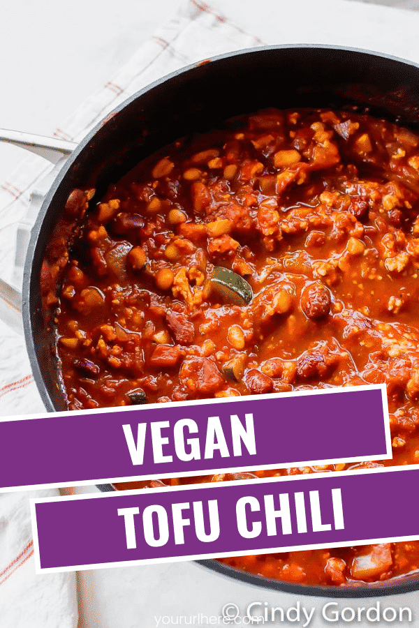 Hearty Tofu Chili is the best vegan comfort food. You can make this chili recipe in less than an hour with tons of succulent veggies and protein-packed beans. #vegansoup #veganrecipes