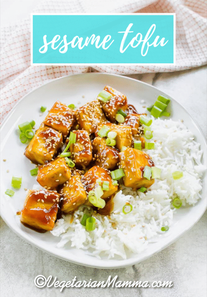 Sesame Tofu is the easiest Asian-inspired vegetarian dish ever! Crispy pan-fried tofu is covered in a soy, honey, and sweet Thai chili sauce and garnished with sesame seeds. #sesametofu #tofu via @vegetarian mamma