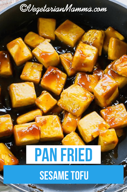 Sesame Tofu is the easiest Asian-inspired vegetarian dish ever! Crispy pan-fried tofu is covered in a soy, honey, and sweet Thai chili sauce and garnished with sesame seeds. #sesametofu #tofu via @vegetarian mamma
