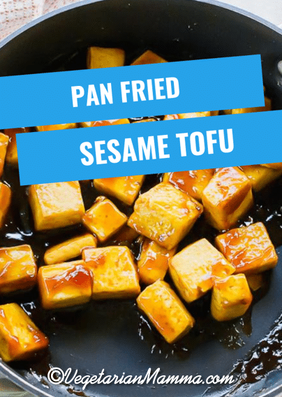 Sesame Tofu is the easiest Asian-inspired vegetarian dish ever! Crispy pan-fried tofu is covered in a soy, honey, and sweet Thai chili sauce and garnished with sesame seeds. #sesametofu #tofu via @vegetarian mamma