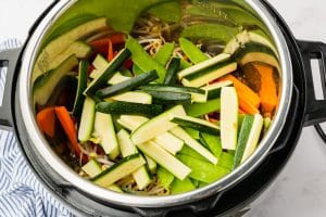 carrots, bean sprouts, snow peas and zucchini. in instant pot