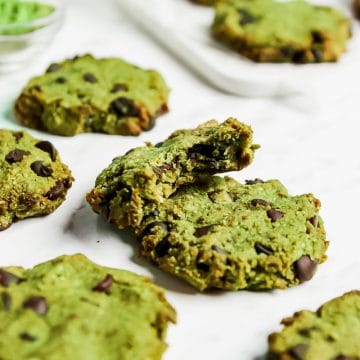 A tray of green matcha chocolate chip cookies