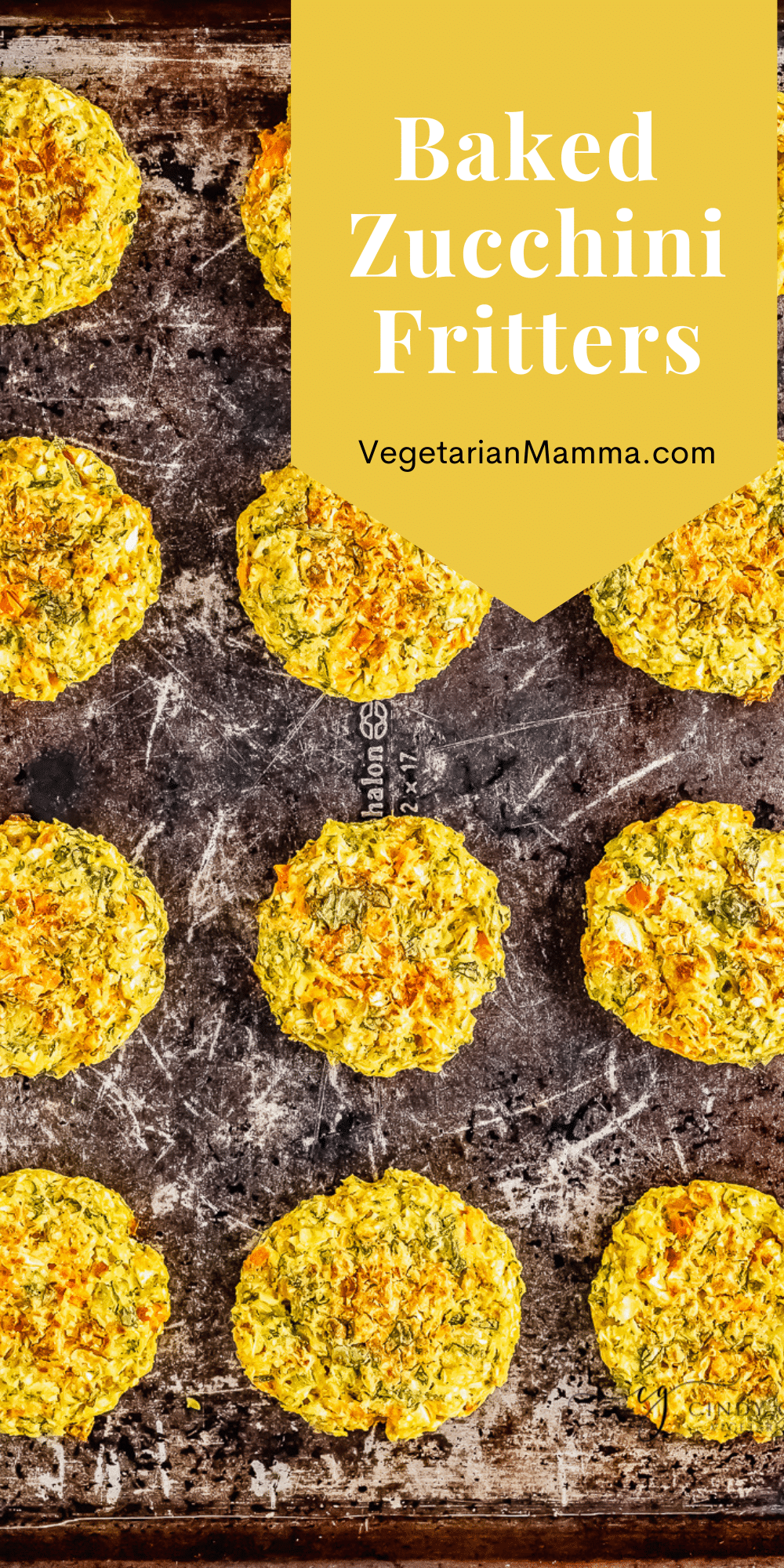 Vegan Zucchini Fritters are so easy to make in the oven! Add carrots and baby spinach for an easy side dish that's ready in 30 minutes.