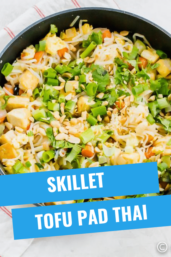 A vegetarian Tofu Pad Thai Recipe with extra vegetables, crunchy peanuts, and fresh herbs. This Pad Thai sauce is sweet and savory and packed with Thai flavors. #tofurecipe #padthai