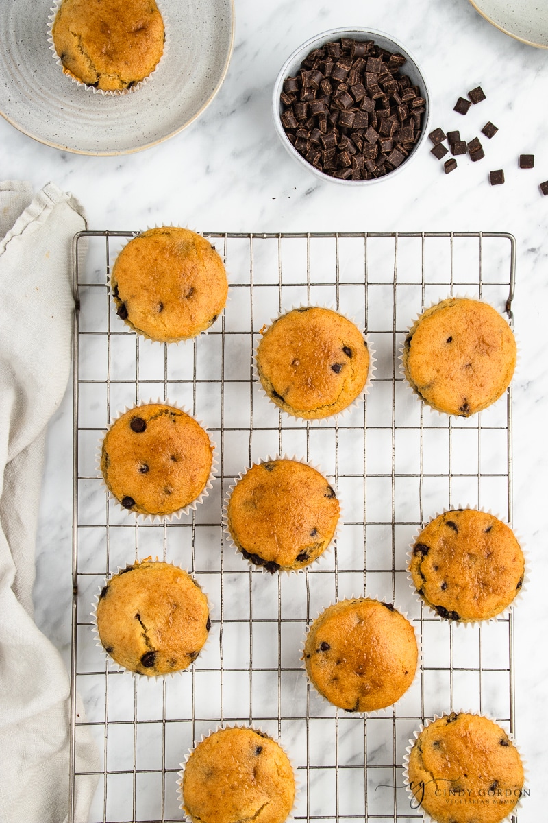 Overhead shot of 10 chocolate chip muffins on a cooling rack