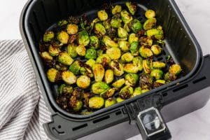 cooked halved brussel sprouts in air fryer