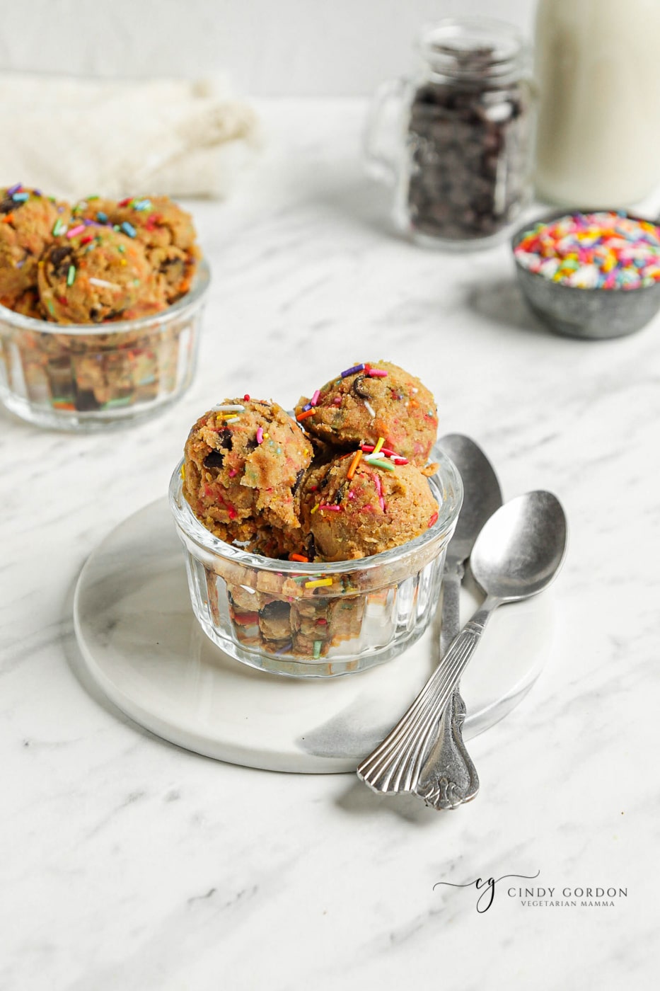 Scoops of edible vegan cookie dough in a glass bowl