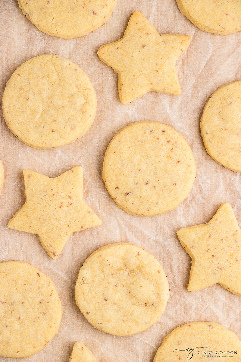 Close-up shot of sugar cookies shaped like stars and circles